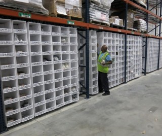 Sliding/hanging cubbies in a warehouse